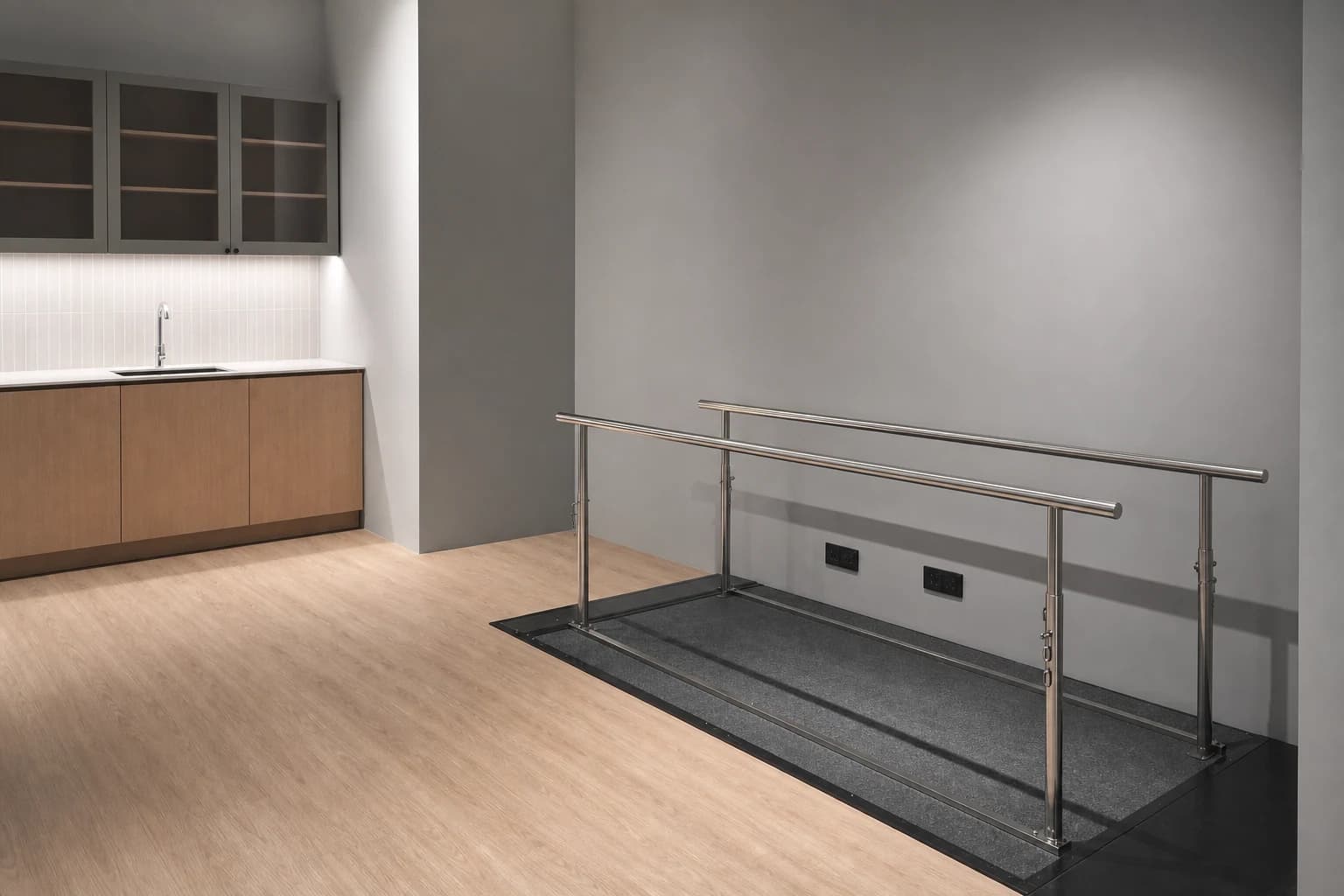 A physio room with parallel bars